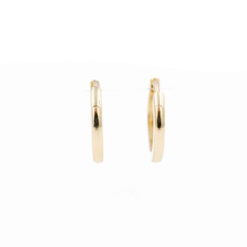 Yellow gold huggie earrings