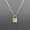 Gold and diamond lock necklace