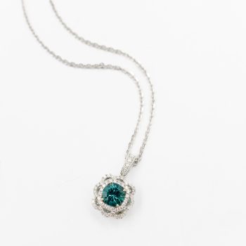 Blue green round Maine tourmaline with diamond halo pendant