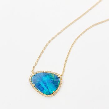Australian opal pendant with diamond halo
